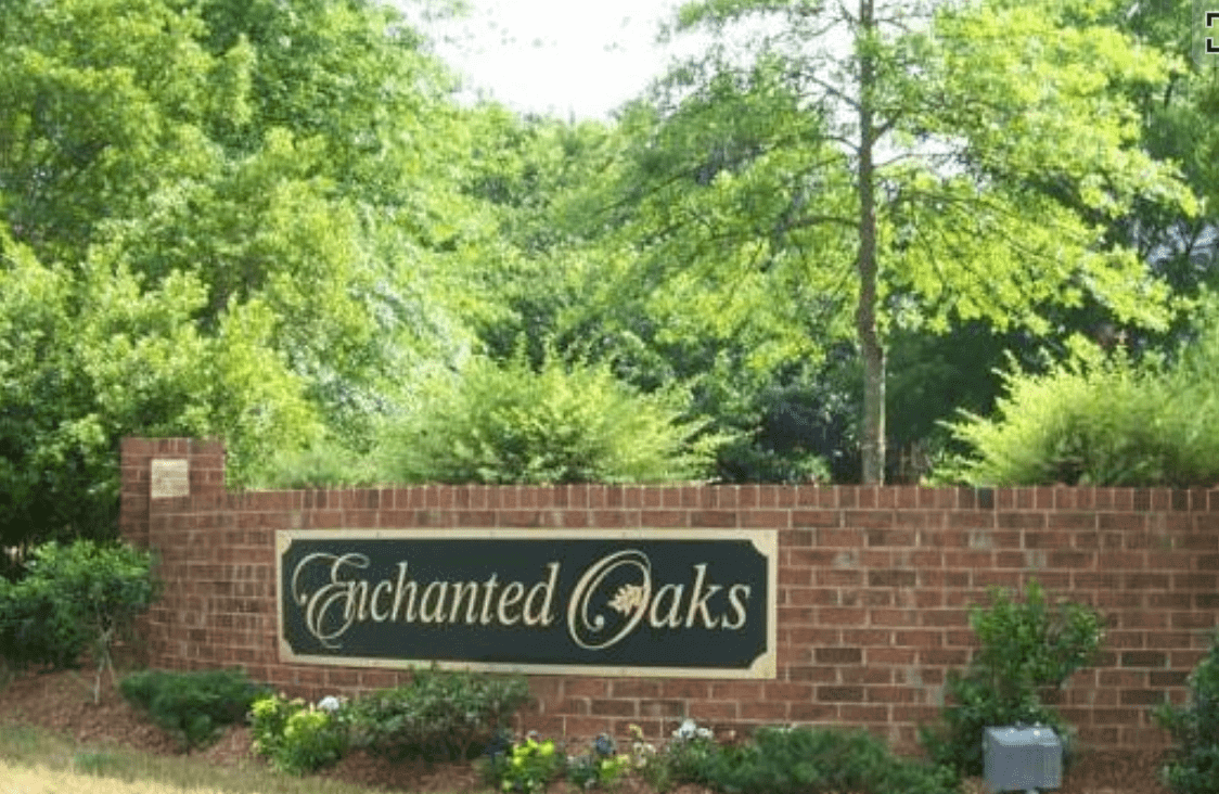 Enchanted Oaks neighborhood sign